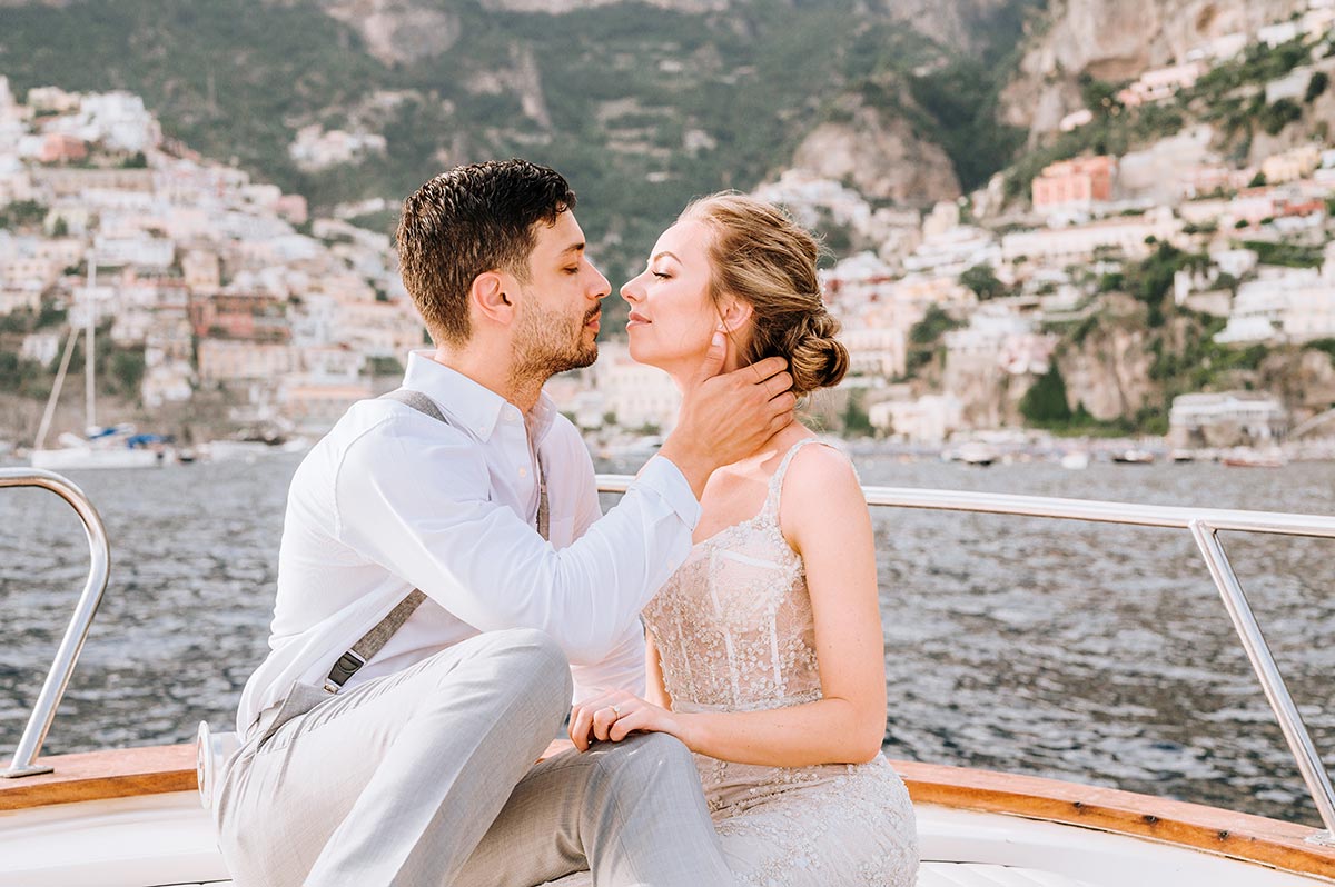 Positano elope on boat | Emiliano Russo | getting married abroad - emiliano russo